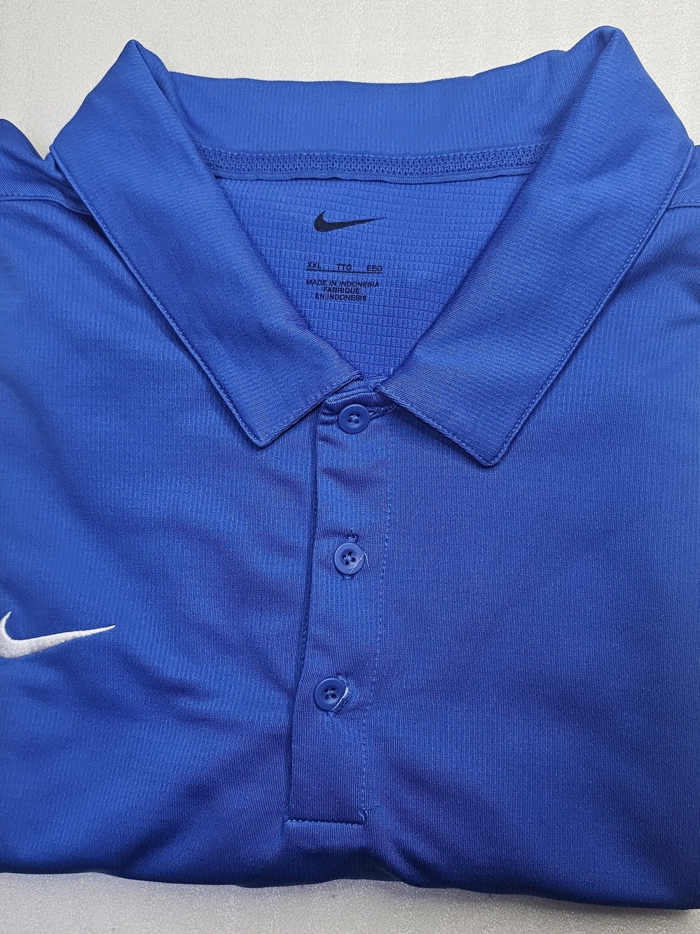 Nike Men’s Bright Blue Polo with White Swoosh